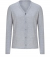 With a cool grey hue and immaculate finishing, Jil Sanders wool cardigan is a classic and luxurious choice - High V-neckline, long sleeves, button-down front - Slim fit - Wear with a button-down, tailored trousers and lace-ups