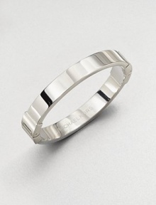 A classic design perfect on it's own or paired with more detailed pieces. Silvertone steelHinged clasp closureDiameter, about 2½Imported A classic design perfect on it's own or paired with more detailed pieces. Silvertone steelHinged clasp closureDiameter, about 2½Imported