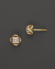 Diamonds sparkle in 14K. yellow gold settings.