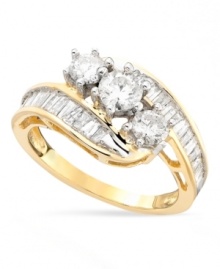 A supremely elegant and feminine diamond ring featuring sparkling round and baguette-cut diamonds (1-1/2 ct. t.w.) in a glamorous bypass style. Set in 14k gold. A supremely elegant and feminine diamond ring featuring sparkling round and baguette-cut diamonds (1-1/2 ct. t.w.) in a glamorous bypass style. Set in 14k gold.