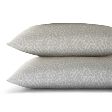 An animal print for a mellow palette-quiet white spots against a muted grey background. An animal print for a mellow palette-quiet white spots against a muted grey background.