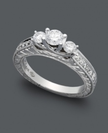 The perfect proposal. This breathtaking diamond ring features a unique, three stone design that shines with the addition of round-cut diamonds (3/4 ct. t.w.) in 14k white gold. The perfect proposal. This breathtaking diamond ring features a unique, three stone design that shines with the addition of round-cut diamonds (3/4 ct. t.w.) in 14k white gold.