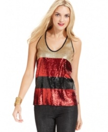 Turn up the shine in this colorblocked sequin top from DKNY Jeans. Turn up the shine in this colorblocked sequin top from DKNY Jeans.