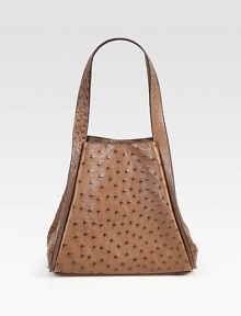 Luxurious ostrich crafted in a roomy carryall.Shoulder straps, 7¾ dropMagnetic snap closure and gussetsProtective metal feetOne inside open pocket12½W X 9¼H X 6¼DImported Luxurious ostrich crafted in a roomy carryall.Shoulder straps, 7¾ dropMagnetic snap closure and gussetsProtective metal feetOne inside open pocket12½W X 9¼H X 6¼DImported