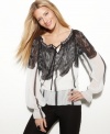 Lace print creates a romantic look on INC's chiffon blouse.