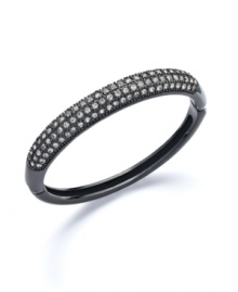 Sweet, contrasting colors play a standout part in your wardrobe. Charter Club's bold bangle features sparkling crystals that pop against a dark background. Crafted in hematite tone mixed metal. Approximate diameter: 2 inches. Sweet, contrasting colors play a standout part in your wardrobe. Charter Club's bold bangle features sparkling crystals that pop against a dark background. Crafted in hematite tone mixed metal. Approximate diameter: 2 inches.