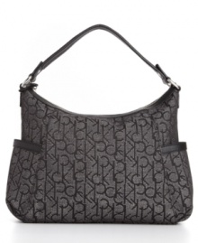 Dress up your casual look with this Macy's Exclusive purse - a chic logo jacquard pattern with easy-access side pockets make it a natural for a Saturday downtown. Dress up your casual look with this Macy's Exclusive purse - a chic logo jacquard pattern with easy-access side pockets make it a natural for a Saturday downtown.