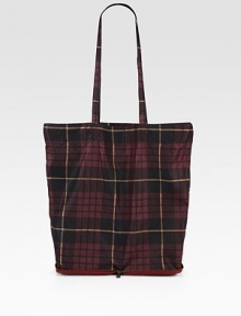 A perfect reusable design that you can keep in your handbag, this lightweight nylon style zips into its luxurious leather bottom.Shoulder straps, 13½ dropOpen top13½W X 16H X 4¾DMade in Italy A perfect reusable design that you can keep in your handbag, this lightweight nylon style zips into its luxurious leather bottom.Shoulder straps, 13½ dropOpen top13½W X 16H X 4¾DMade in Italy