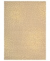 A chic starburst pattern adorns this stylish rug from the Capri collection, offering a unique focal point for any room. Woven of a blend of fine wool with Nourison's signature light-reflecting Luxcelle(tm) fibers, the rug's soft beige shade and luminous appearance complement a range of decors.