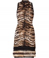 A luxe iteration of the brands iconic look, this fur-trimmed tiger print dress from Roberto Cavalli puts a glamorous spin on cocktail hour - High-neckline with black knit trim, sleeveless, tiered raccoon fur and ruffled black knit trim, pull-over style - Form-fitting - Wear with jet black accessories and statement fine jewelry