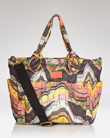 Bring up baby to love designer style with this baby bag from MARC BY MARC JACOBS. Equipped with plenty of pockets, the carryall keeps little one's essentials organized without fuss. Bring up baby to love designer style with this baby bag from MARC BY MARC JACOBS. Equipped with plenty of pockets, the carryall keeps little one's essentials organized without fuss.