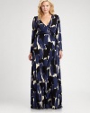 A bold brushstroke print on silky jersey distinguishes this sleek and simple maxi wrap dress that ties at the side.Crossover V necklineLong sleevesSide tiesTie beltLong flowing skirtAbout 48 from natural waistModal/spandexDry cleanMade in USA