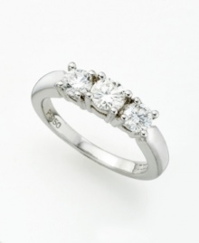 A symbol of classic luxury, this three stone ring features prong-set, round-cut diamonds (1 ct. t.w.). Diamond ring set in 18k white gold. A symbol of classic luxury, this three stone ring features prong-set, round-cut diamonds (1 ct. t.w.). Diamond ring set in 18k white gold.