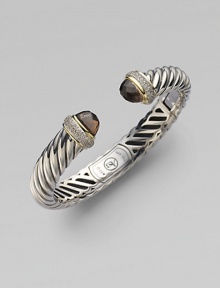 From the Waverly Collection. A sculpted cable design of sterling silver, capped with smoky quartz, and banded with 18k yellow gold and pavé diamonds.Diamonds, 0.40 tcw 18k yellow gold Sterling silver Cable, 10mm Diameter, about 2¼ Hinge clasp Imported