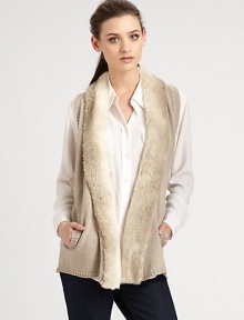 Faux fur shawl collar, convenient slash pockets and a sporty racerback revive this classic knit vest. Faux fur shawl collarSlash pocketsRacerbackAbout 26 from shoulder to hemBody: 38% viscose/35% nylon/22% merino wool/5% alpacaFaux fur trim: 85% acrylic/15% polyesterDry cleanImportedModel shown is 5'10 (177cm) wearing US size X-Small/Small. Faux fur shawl collar, convenient slash pockets and a sporty racerback revive this classic knit vest. Faux fur shawl collarSlash pocketsRacerbackAbout 26 from shoulder to hemBody: 38% viscose/35% nylon/22% merino wool/5% alpacaFaux fur trim: 85% acrylic/15% polyesterDry cleanImportedModel shown is 5'10 (177cm) wearing US size X-Small/Small.