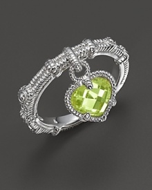 A faceted peridot heart dangles from an intricately detailed sterling silver band. By Judith Ripka.