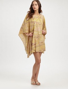A classic exotic design inspired by the beloved caftan, featuring chic muted colors and a beyond-flattering silhouette. BoatneckKimono sleevesPull-on style85% nylon/15% metallic threadDry cleanMade in Italy A classic exotic design inspired by the beloved caftan, featuring chic muted colors and a beyond-flattering silhouette. BoatneckKimono sleevesPull-on style85% nylon/15% metallic threadDry cleanMade in Italy