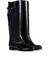 Give your look a flawless equestrian edge with Ralph Lauren Collections burnished black calfskin boots - Rounded toe, buckled top strap, wheeled welt, short stacked leather heel - Knee height - Ideal for wearing with knit dresses, tights and mini-skirts, or ultra skinny jeans