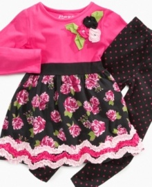Pluck a pretty look. With flower appliques and a floral-print skirt, this dress and leggings set from Flapdoodles makes her pretty as a petal. Pluck a pretty look. With flower appliques and a floral-print skirt, this dress and leggings set from Flapdoodles makes her pretty as a petal.