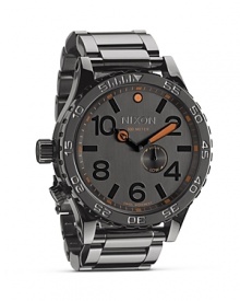 Designed for high-impact performance and style, this boldly sized watch from Nixon features 300-meter water resistance, an easy to read dial, and sturdy bracelet. Designed for high-impact performance and style, this boldly sized watch from Nixon features 300-meter water resistance, an easy to read dial, and sturdy bracelet.