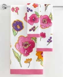 Blossoms in bloom. Bold, impressionistic florals in a fusion of dazzling colors creates a modern flair in this Floral Fusion fingertip towel. Blossoms in bloom. Bold, impressionistic florals in a fusion of dazzling colors creates a modern flair in this Floral Fusion fingertip towel.