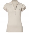 A feminine choice with its deep V-neckline and sweet puffed short sleeves, Burberry Brits polo shirt is a stylish way to dress up your basics - Spread collar, V-neckline, puffed short sleeves, partial button placket with characteristic check trim - Form-fitting - Channel preppy style and wear with jeans and bright loafers