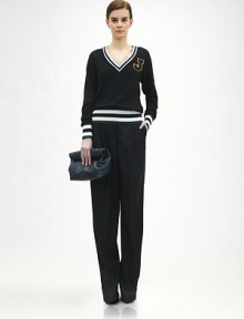 Striped, sporty trim and a signature 'J' appliqué give this wool pullover a collegiate flair.V necklineRib-knit cuffs and hemSignature 'J' appliquéWoolDry cleanMade in ItalyModel shown is 5'11 (180cm) wearing US size 4. Striped, sporty trim and a signature 'J' appliqué give this wool pullover a collegiate flair.V necklineRib-knit cuffs and hemSignature 'J' appliquéWoolDry cleanMade in ItalyModel shown is 5'11 (180cm) wearing US size 4.