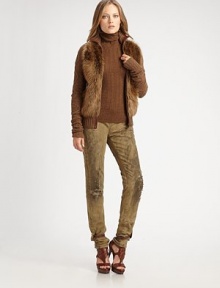 Stay warm and chic in this cabled design accented with natural shearling. Stand collarLong cabled sleevesFront zip closure Front slash pocketsAbout 24 from shoulder to hem90% merino wool/10% angoraDry cleanImported Fur origin: Italy Model shown is 5'7½ (171cm) wearing US size Small.