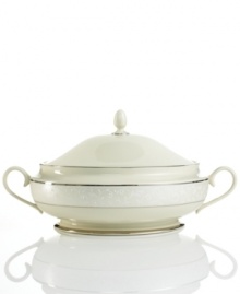 Welcome your guests to the table with the formal elegance of Pearl Innocence dinnerware. This fine bone china vegetable bowl brings together a graceful tone-on-tone design with hand enameled pearl-like accents and rich bands of polished platinum. Welcome your guests to the table with the formal elegance of Pearl Innocence dinnerware. This fine bone china vegetable bowl brings together a graceful tone-on-tone design with hand enameled pearl-like accents and rich bands of polished platinum.