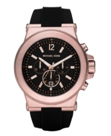 Bright rose-gold tone metal makes an impact against this black-on-black watch by Michael Kors. Bright rose-gold tone metal makes an impact against this black-on-black watch by Michael Kors.