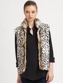A leopard printed, dyed rabbit style in an easy to layer vest design. Stand collarSleevelessOpen frontAbout 24 from shoulder to hemFully linedDyed rabbitSpecialist dry cleanImported Fur origin: Spain A leopard printed, dyed rabbit style in an easy to layer vest design. Stand collarSleevelessOpen frontAbout 24 from shoulder to hemFully linedDyed rabbitSpecialist dry cleanImported Fur origin: Spain