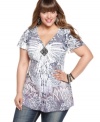 Show off your wild side with One World's short sleeve plus size top, showcasing a sublimated print!