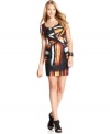 Jessica Simpson's dress features an alluring abstract print and a flattering crisscross detail at the waist.