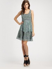 Tiered skirt and sassy scoopback enliven this striped silk number. ScoopneckSleevelessTiered skirtScoopbackAbout 23 from natural waistSilkDry cleanImported