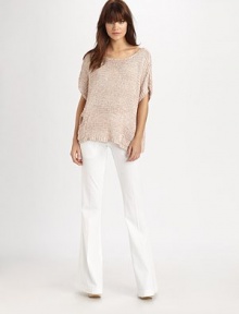 Slip into this delicate, extra soft crochet knit for a beautiful yet relaxed look. BoatneckDropped shouldersShort dolman sleevesDual front patch pocketsRibbed hem87% cotton/13% silkDry cleanImportedModel shown is 5'10 (177cm) wearing US size Small. Slip into this delicate, extra soft crochet knit for a beautiful yet relaxed look. BoatneckDropped shouldersShort dolman sleevesDual front patch pocketsRibbed hem87% cotton/13% silkDry cleanImportedModel shown is 5'10 (177cm) wearing US size Small.