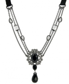 A refined design. T Tahari's Crystal Elegance collection necklace features a dramatic triple chain silhouette. Adorned with grosgrain ribbon, hand-face jet crystals and sparkling crystal accents, it's made in nickel-free hematite tone mixed metal. Approximate length: 24 inches + 4-inch extender. Approximate drop: 3-3/4 inches.