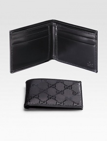 A smaller edition of the classic wallet is detailed in signature GG imprimé with leather trim and interior. One bill compartment Four card slots 4W X 3H Made in Italy A smaller edition of the classic wallet is detailed in signature GG imprimé with leather trim and interior. One bill compartment Four card slots 4W X 3H Made in Italy