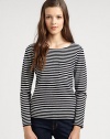 Striped, long-sleeve pocket tee renewed by a plush wool finish and ribbed trim. BoatneckSingle front patch pocketLong sleevesRibbed cuffs and hemWoolDry cleanImportedModel shown is 5'10 (177cm) wearing US size Small.