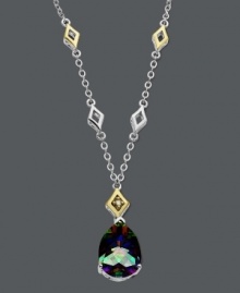Add an elusive drop of color to your neckline. An enigmatic mystic topaz gemstone (6-1/2 ct. t.w.) and round-cut diamond accents will reflect a rainbow of colors within a chic sterling silver and 14k gold setting. Approximate length: 16 inches. Approximate drop: 1 inch. Add an elusive drop of color to your neckline. An enigmatic mystic topaz gemstone (6-1/2 ct. t.w.) and round-cut diamond accents will reflect a rainbow of colors within a chic sterling silver and 14k gold setting. Approximate length: 16 inches. Approximate drop: 1 inch.