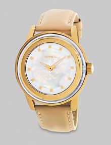 From the Orchestra Collection. Supple leather adds interest to this classic timepiece. Quartz movementWater resistant to 10 ATMRound goldtone ion-plated stainless steel case, 40.5mm (1.6) Smooth bezelMother-of-pearl dialDot hour markersTan leather strapImported