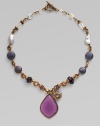 A pretty strand of amethyst, rose quartz, lepidorite, fuchsia agate, rock crystal, pink, purple and pink lavender cultured freshwater pearls with a charm accented, statement rock crystal over phosphosiderite pendant. Pink, purple and pink lavender cultured freshwater pearls Amethyst, rose quartz, lepidorite, fuchsia agate, rock crystal PhosphosideriteBronzeLength, about 18Pendant size, 1½ Toggle closureMade in USA