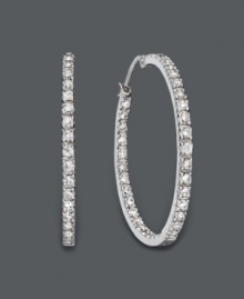 Glam it up girl! These large hoop earrings by B. Brilliant have style and sparkle to boot. Features dozens of round-cut cubic zirconias (1-9/10 ct. t.w.) in a shining, sterling silver setting. Approximate diameter: 3 inches.