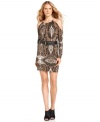 A sophisticated MICHAEL Michael Kors paisley dress gets a sultry makeover with cutout shoulders and a flattering belted waist. Give it a chic, modern boost with statement sandals or edgy booties.