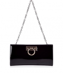 Inimitable Italian craftsmanship meets classic elegance with Salvatore Ferragamos luxurious patent leather Norina clutch - Traditional envelope shape with a detachable chain link handle and silver Gancio bit accent - Magnetic closure and satin lining - Single interior open pocket - Perfect for parties and cocktails and roomy enough to fit all of the evening essentials - Height: 4.75 - Width: 9 - Depth: 1.25 - Made in Italy Inimitable Italian craftsmanship meets classic elegance with Salvatore Ferragamos luxurious patent leather Norina clutch - Traditional envelope shape with a detachable chain link handle and silver Gancio bit accent - Magnetic closure and satin lining - Single interior open pocket - Perfect for parties and cocktails and roomy enough to fit all of the evening essentials - Height: 4.75 - Width: 9 - Depth: 1.25 - Made in Italy