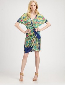 A vibrant print highlights this draped blouson style finished with soft pleats from hip to hem.V necklineDropped shouldersDolman sleevesBlouson bodiceElastic waistbandPleated mock-wrap skirtAbout 22 from natural waistRayonDry cleanMade in USA of imported fabricModel shown is 5'10½ (179cm) wearing US size Small. A vibrant print highlights this draped blouson style finished with soft pleats from hip to hem.V necklineDropped shouldersDolman sleevesBlouson bodiceElastic waistbandPleated mock-wrap skirtAbout 22 from natural waistRayonDry cleanMade in USA of imported fabricModel shown is 5'10½ (179cm) wearing US size Small.