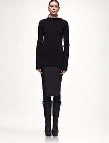Supple leather, tailored with an artfully overlapped back.Asymmetrical hemline with back overlapFully linedAbout 28 longLeatherDry cleanImportedModel shown is 5'11 (180cm) wearing US size 4. Supple leather, tailored with an artfully overlapped back.Asymmetrical hemline with back overlapFully linedAbout 28 longLeatherDry cleanImportedModel shown is 5'11 (180cm) wearing US size 4.