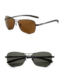 A caravan design with lightweight carbon frames. Available in black with crystal green lens or dark brown with crystal brown lens. UV400 lens 100% UV protective Made in Italy A caravan design with lightweight carbon frames. Available in black with crystal green lens or dark brown with crystal brown lens. UV400 lens 100% UV protective Made in Italy
