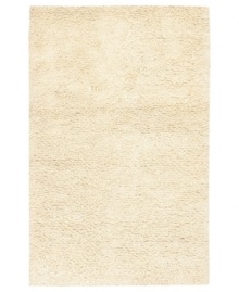 Step onto a cloud-soft area rug in rich, felted ivory wool. Offering one of the thickest, plushest hands in the industry, the Surya Metropolitan area rug billows with softness in every space.