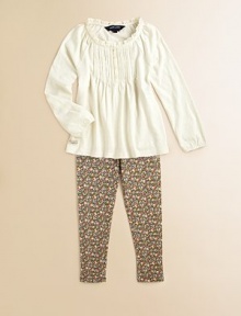 The bohemian-inspired peasant top is crafted from soft, comfortable cotton jersey detailed with charming lace and pintucking.Lace-trimmed round necklineLong raglan sleevesPintucked button-frontEven-sewn flared hemCottonMachine washImported Please note: Number of buttons may vary depending on size ordered. The bohemian-inspired peasant top is crafted from soft, comfortable cotton jersey detailed with charming lace and pintucking.Lace-trimmed round necklineLong raglan sleevesPintucked button-frontEven-sewn flared hemCottonMachine washImported Please note: Number of buttons may vary depending on size ordered.