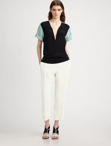 Equal parts sexy and casual, finished with cuffed, contrasting sleeves, contrast shoulder trim, and a plunging V front.Plunging V necklineContrast trim on shouldersContrasting cuffed cap sleeves68% acetate/32% silkDry cleanMade in ItalyModel shown is 5'9 (175cm) wearing US size 4. Equal parts sexy and casual, finished with cuffed, contrasting sleeves, contrast shoulder trim, and a plunging V front.Plunging V necklineContrast trim on shouldersContrasting cuffed cap sleeves68% acetate/32% silkDry cleanMade in ItalyModel shown is 5'9 (175cm) wearing US size 4.